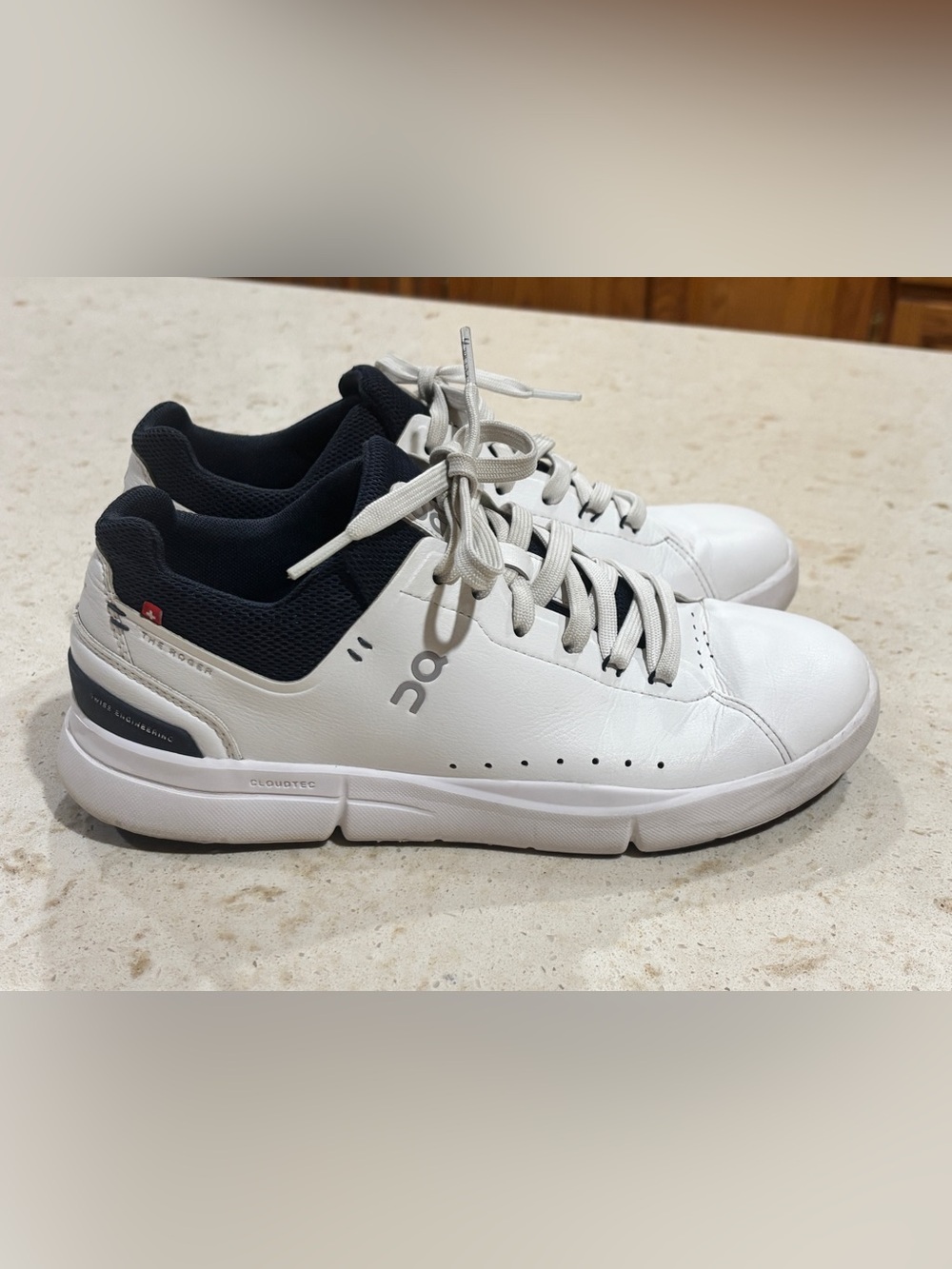 On Cloud Running Swiss Eng Women’s White Leather Sneakers with Navy Collar